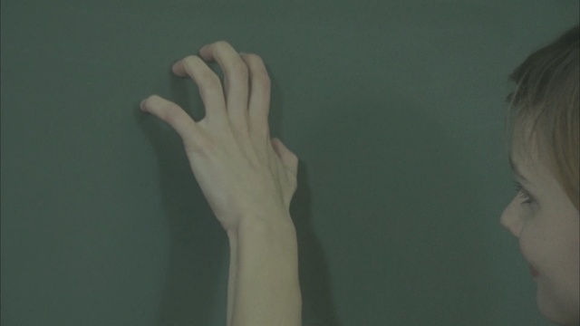 Video Reference: hand, finger, arm, chin, girl, neck, sign language, thumb, joint