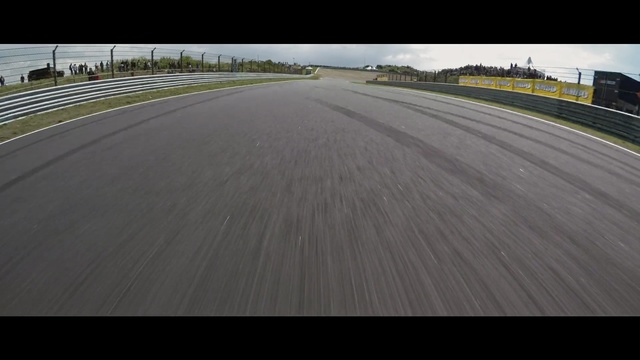 Video Reference: Race track, Sport venue, Asphalt, Vehicle, Racing, Photography, Performance car, Lane, Road surface, Road
