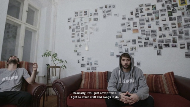 Video Reference: Text, Wall, Room, Wallpaper, Font, Sitting, Furniture, Interior design