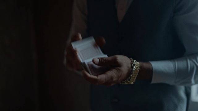 Video Reference: Hand, Arm, Finger, Wrist, Suit, Fashion accessory, Formal wear, Gesture