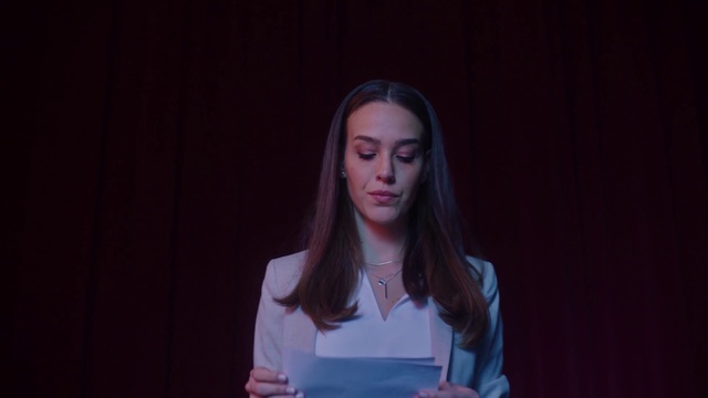 Video Reference: Face, Blue, Head, Chin, Performance, Fun, Long hair, Hand, Scene, Performing arts