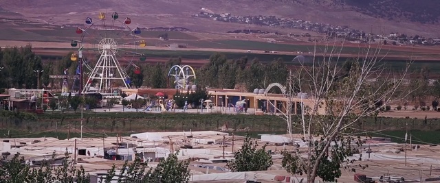 Video Reference: Tourist attraction, Amusement park, Amusement ride, Ferris wheel, Park, Nonbuilding structure