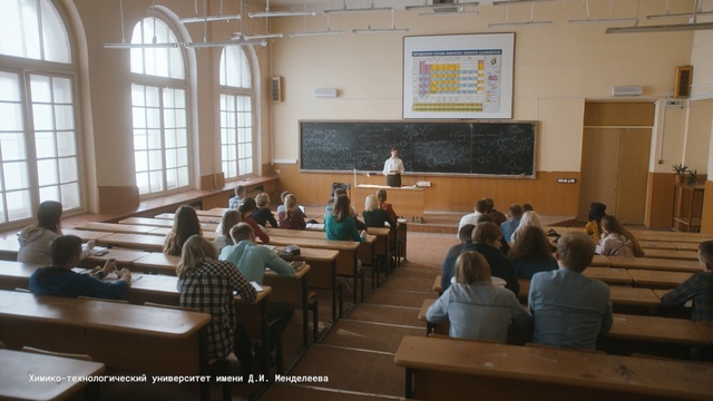 Video Reference: Classroom, Room, Event, Class, Building, Seminar, Education, Lecture, Meeting, Person