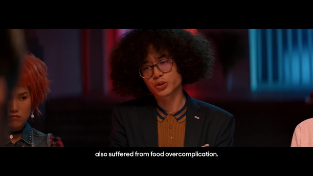 Video Reference: screenshot, song, fun, glasses, performance, girl, conversation, scene, darkness, communication, Person