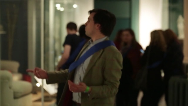 Video Reference: suit, event, interaction, conversation, ceremony, girl, fun, Person