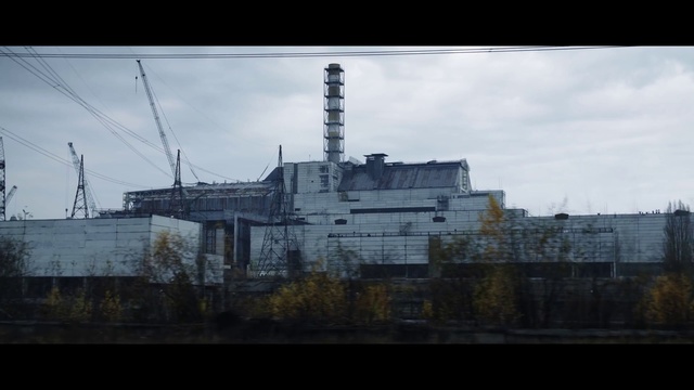 Video Reference: Architecture, Sky, Industry, Building, Factory, Screenshot, City, Electricity, Outdoor, Train, Large, View, Light, Bridge, Track, Traveling, Street, Water, Cloudy, Standing, Snow, River, Tall, White, Traffic, Riding, Boat, Field, Sign, Rain, Man, Cloud, Tower, Skyscraper, Abandoned, Day