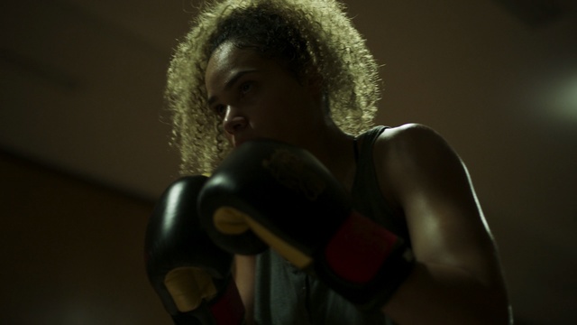 Video Reference: boxing glove, boxing, audio, microphone, darkness, hand, boxing equipment, audio equipment, performance, girl