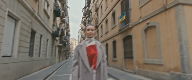 Video Reference: Snapshot, Facade, Pedestrian, Architecture, Neighbourhood, Street, Outerwear, Photography, Street fashion, Road, Person