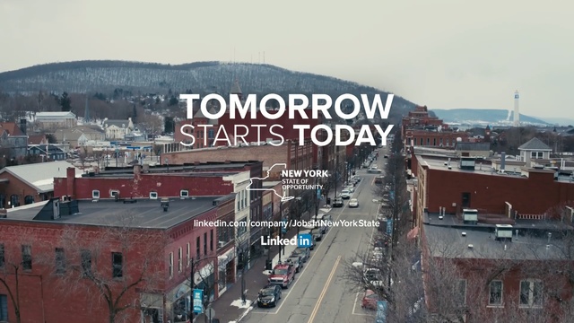 Video Reference: town, city, urban area, sky, car, downtown, roof, residential area, street, vehicle