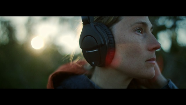 Video Reference: face, nose, audio equipment, audio, screenshot, ear, chin, eye, electronic device, forehead, Person