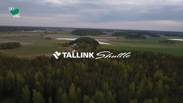 Video Reference: Aerial photography, Nature, Plain, Land lot, Natural environment, Natural landscape, Grassland, Highland, Rural area, Photography, Grass, Outdoor, Field, Green, Man, Large, Standing, Sign, Yellow, Grassy, Water, Tree, Road, Flying, White, Holding, People, Street, Hill, Plane, Game, Air, Group, Sky, Cloud, Text, Plant, Lush