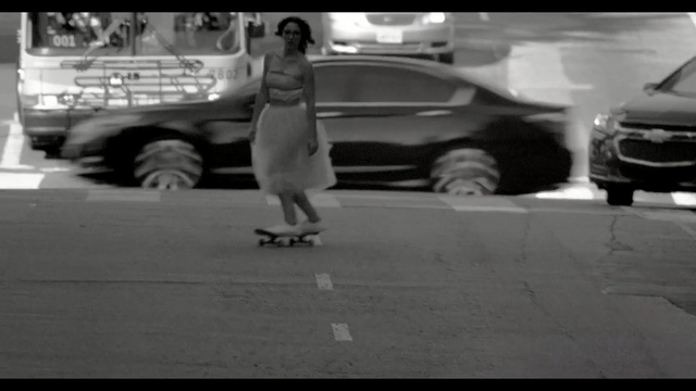 Video Reference: black, black and white, footwear, asphalt, family car, monochrome photography, mode of transport, photography, snapshot, monochrome, Person