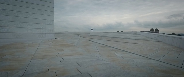 Video Reference: sky, cloud, roof, architecture, wall, floor, road surface, line, daylighting, horizon