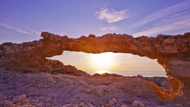Video Reference: natural arch, sky, badlands, formation, rock, canyon, morning, geology, wadi, horizon