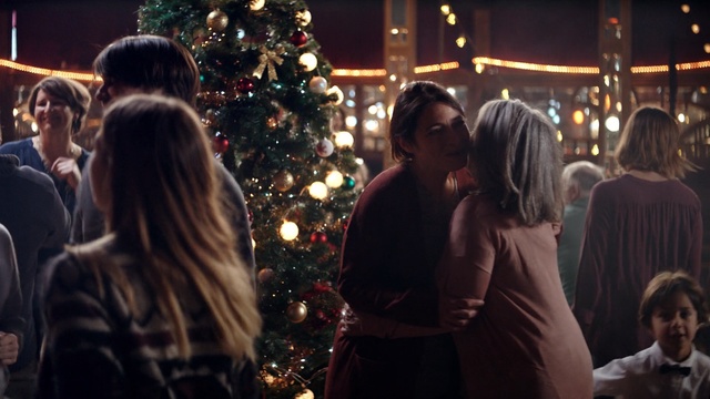 Video Reference: event, christmas decoration, christmas, crowd, night, girl, tradition, tree, decor, city, Person