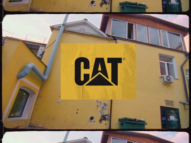 Video Reference: Yellow, Font, Facade, Sign, Signage, Architecture, House, Traffic sign, Building, Art