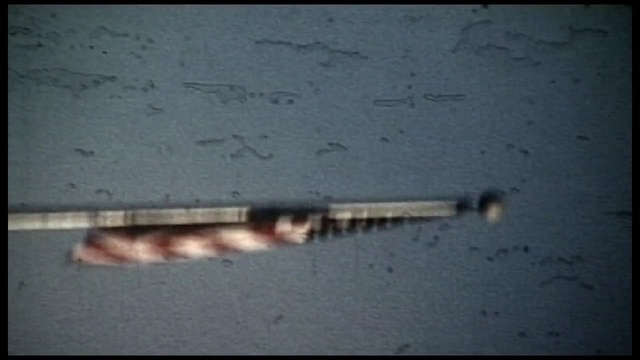 Video Reference: text, mode of transport, weapon, line, font, gun barrel