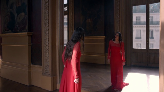 Video Reference: Red, Dress, Formal wear, Temple, Indoor, Person, Window, Girl, Standing, Woman, Front, Room, Looking, Table, Young, Living, Sitting, Little, Holding, Man, Walking, Suitcase, Television, Kitchen, People, Luggage, Playing, White, Video, Group, Night, Floor, Clothing