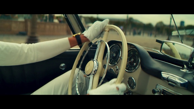 Video Reference: Land vehicle, Vehicle, Car, Steering wheel, Vintage car, Steering part, Driving, Classic car, Bugatti, Classic