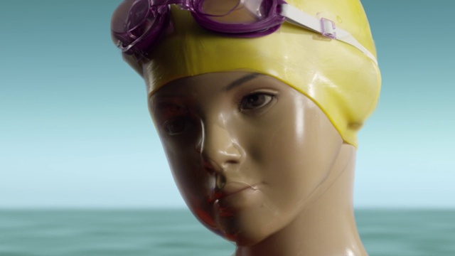 Video Reference: Head, Yellow, Chin, Forehead, Personal protective equipment, Swim cap, Cap, Mannequin, Headgear, Eyewear