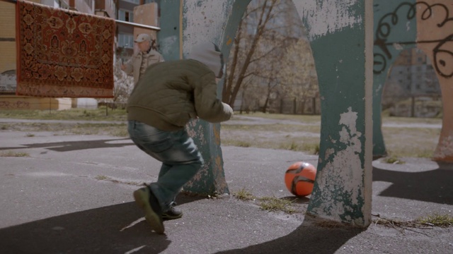Video Reference: Public space, Asphalt, Tree, Sidewalk, Road surface, Road, Pedestrian, Street