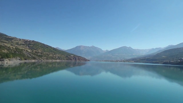 Video Reference: Body of water, Highland, Nature, Lake, Water resources, Mountainous landforms, Mountain, Sky, Reservoir, Water