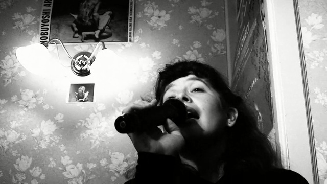 Video Reference: black, photograph, black and white, monochrome photography, photography, snapshot, monochrome, darkness, singing, microphone, Person