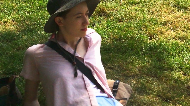 Video Reference: vertebrate, grass, headgear, girl, black hair, plant, recreation, adventure, tree, vacation