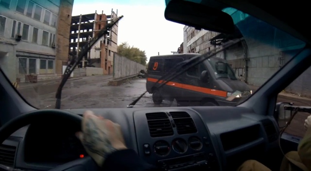 Video Reference: Vehicle, Mode of transport, Windshield, Car, Driving, Automotive window part, Auto part, Automotive mirror, Glass, Automotive exterior, Outdoor, Building, Street, Small, Traffic, Sitting, Man, City, Light, Parked, Black, Truck, Mirror, White, Old, Dog, Red, Standing, Motorcycle, Riding, Plane, People, Land vehicle, Sky, Wheel, Control panel