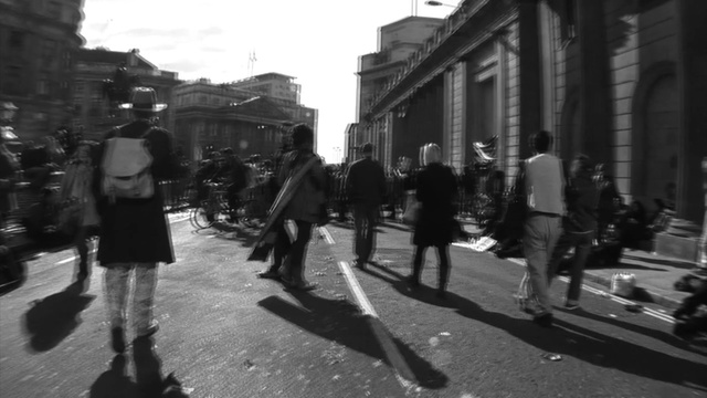 Video Reference: white, black, road, photograph, street, black and white, pedestrian, urban area, infrastructure, monochrome photography, Person