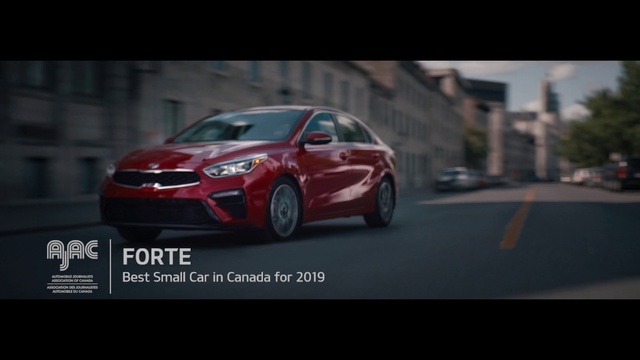 Video Reference: Land vehicle, Vehicle, Car, Automotive design, Mid-size car, Kia motors, Hatchback, Compact car, Full-size car, Subcompact car, Road, Outdoor, Red, Street, Small, City, Driving, Traffic, Riding, Black, White, Man, Fire, Racing, Sign, Parked, Text, Wheel, Hyundai, Honda, Auto racing