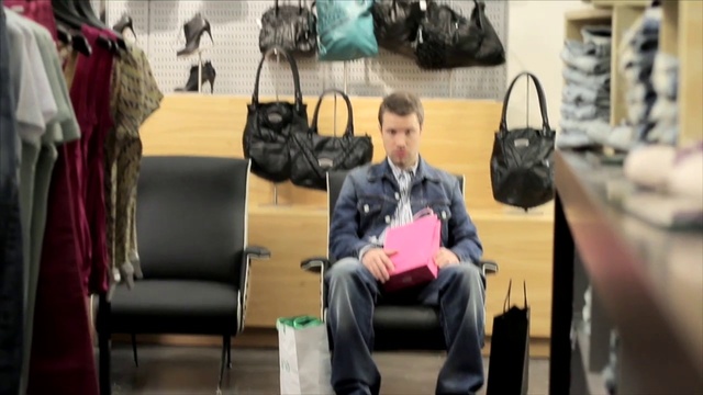 Video Reference: Transport, Fashion, Sitting, Footwear, Textile, Street fashion, Baggage, Passenger, Fashion design, Shoe