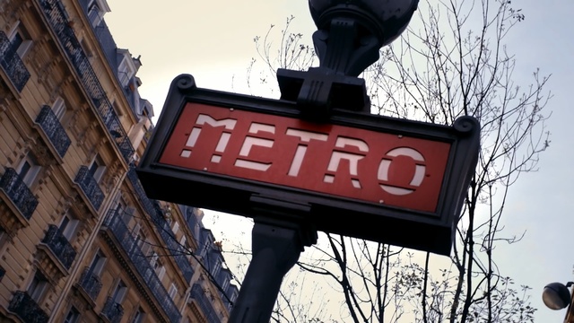 Video Reference: Street sign, Signage, Sign, Electronic signage, Sky, Metropolitan area, Font, Architecture, Traffic sign, City