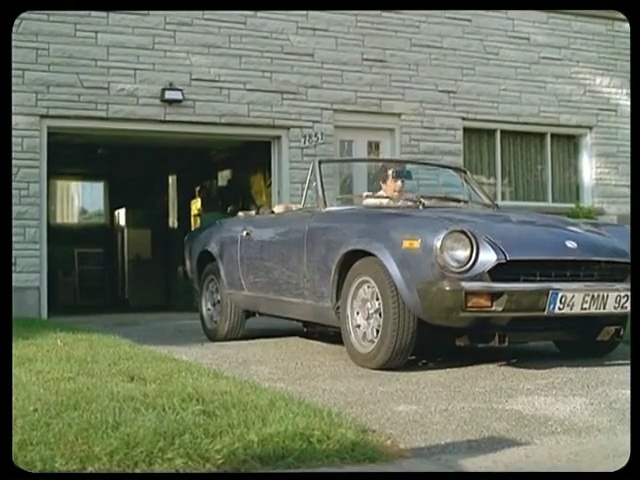 Video Reference: car, land vehicle, vehicle, family car, mode of transport, convertible, classic car, automotive design, city car, personal luxury car, Person