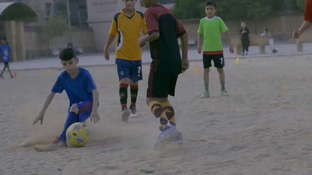 Video Reference: sports, team sport, ball game, competition event, fun, leisure, play, player, beach soccer, tournament, Person