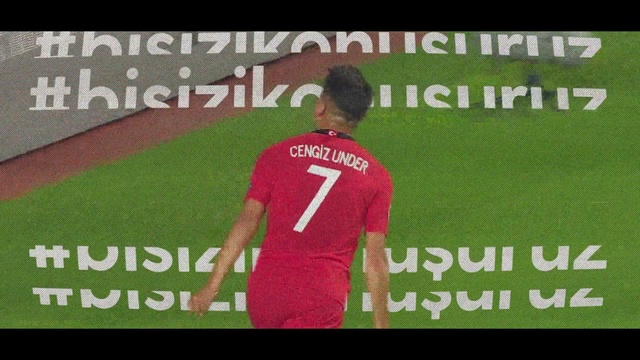 Video Reference: Football player, Font, Sport venue, Player, Text, Grass, Stadium, Photo caption, Team, Photography