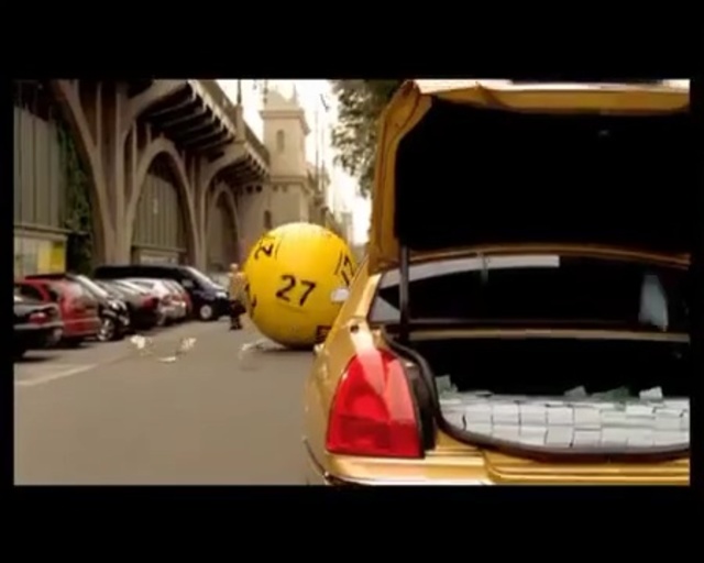 Video Reference: Land vehicle, Vehicle, Car, Motor vehicle, Yellow, Automotive design, Mode of transport, Automotive exterior, Asphalt, Luxury vehicle