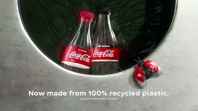 Video Reference: Coca-cola, Cola, Carbonated soft drinks, Coca, Drink, Soft drink, Bottle, Glass bottle, Plant, Non-alcoholic beverage, Indoor, Table, Sitting, Wine, Food, Counter, Computer, Side, Banana, Laying, Bowl, Glass, Fruit, Red, White, Desk, Kitchen, Brush, Water, Airplane, Sink, Plate, Text, Beer, Tin can