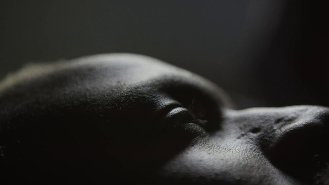 Video Reference: Face, Black, Nose, Head, Lip, Skin, Black-and-white, Close-up, Mouth, Darkness