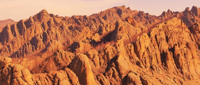 Video Reference: badlands, rock, wilderness, mountainous landforms, canyon, escarpment, mountain, formation, geology, national park