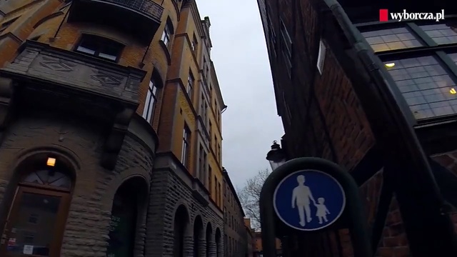Video Reference: Street, Architecture, Metropolitan area, Infrastructure, Building, Neighbourhood, Metropolis, Road, Signage, Pedestrian, Person