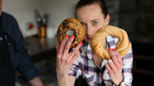 Video Reference: Simit, Python, Food, Bagel, Baked goods, Snake, Bread, Boa, Pretzel, Python family, Person