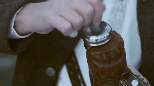 Video Reference: Bottle, Product, Drink, Hand, Glass bottle, Drinkware, Alcohol, Finger, Person