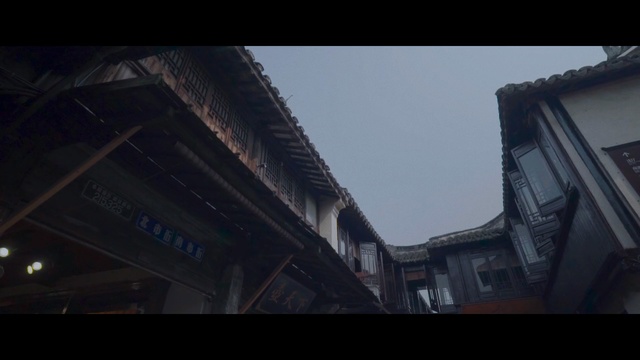 Video Reference: sky, mode of transport, screenshot, building, darkness, midnight, facade, roof, night