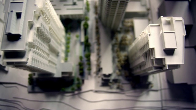 Video Reference: Architecture, Electronics, Font, Technology, Building, Scale model, House, City, Person