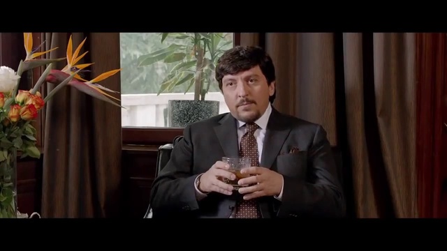 Video Reference: Suit, Facial expression, Speech, Formal wear, Conversation, Snapshot, Tuxedo, White-collar worker, Fun, Businessperson