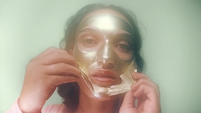 Video Reference: mask, gag, covering, device, restraint, face, protective covering, Person