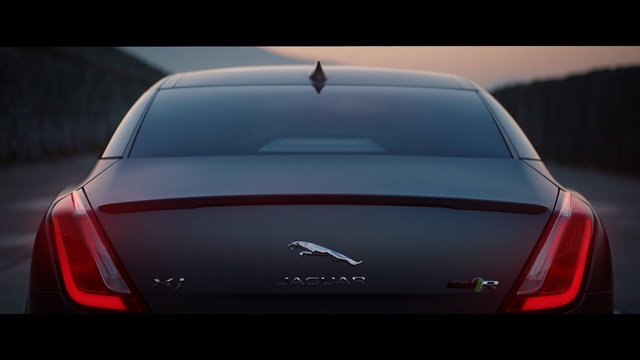 Video Reference: car, motor vehicle, land vehicle, vehicle, luxury vehicle, black, automotive design, performance car, light, personal luxury car