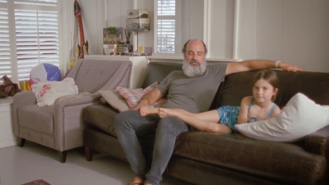 Video Reference: furniture, couch, room, sitting, chair, fun, house, product, interior design, comfort, Person