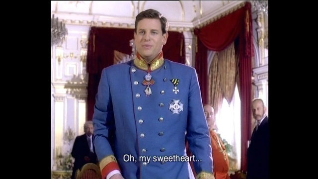 Video Reference: suit, formal wear, gentleman, outerwear, fashion, official, uniform, speech, tuxedo, Person